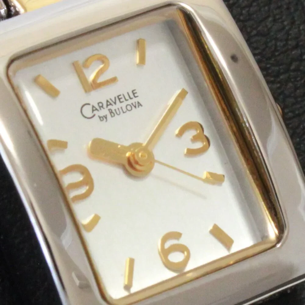Caravelle Ladies Silver Tone With Gold Accents ½ Bangle Bracelet MOP Dial 16mm